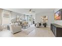 Spacious living room with lots of natural light at 107 Santarem Cir, Punta Gorda, FL 33983