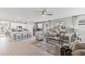 Open living room and kitchen with modern finishes at 107 Santarem Cir, Punta Gorda, FL 33983
