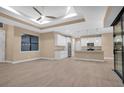 Modern kitchen with white cabinets, granite countertops, and stainless steel appliances at 13164 Amaryllis Cir, Port Charlotte, FL 33981