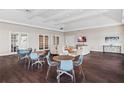 Bright community room with seating areas and large windows at 1425 Powell Valley Dr, Port Charlotte, FL 33953