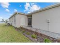 Home exterior with walkway and landscaping at 8883 Saint Kitts Cir, Englewood, FL 34224