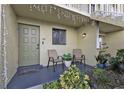Inviting front entry with seating and landscaping at 25225 Rampart Blvd # 1901, Punta Gorda, FL 33983