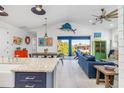 Bright kitchen with colorful countertops and an open floor plan at 28492 Royal Palm Dr, Punta Gorda, FL 33982