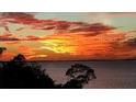 Stunning sunset over the water, creating a picturesque view at 101 N Marion Ct # 133, Punta Gorda, FL 33950