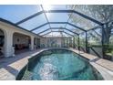 Inviting screened pool with ample space for lounging at 7529 Coral Tree, Punta Gorda, FL 33955