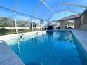 Inviting screened-in pool, perfect for relaxation at 23308 Painter Ave, Port Charlotte, FL 33954