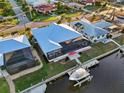 Aerial view of home with pool and boat dock at 2750 W Marion Ave, Punta Gorda, FL 33950