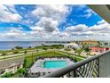 Stunning aerial view of waterfront property with pool and bay at 1425 Park Beach Cir # 149, Punta Gorda, FL 33950