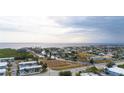 Aerial view of waterfront property with canal access and nearby homes at 22278 Vick St # A100, Punta Gorda, FL 33980