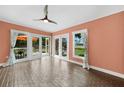 Bright Gathering room with tile floors and access to a patio at 22481 Vale Ave, Punta Gorda, FL 33980