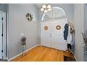 Bright entryway with hardwood floors and double doors at 16253 Cape Horn Blvd, Punta Gorda, FL 33955