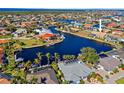 Property's location shown with respect to the canal and other houses at 2427 St Davids Island Ct, Punta Gorda, FL 33950