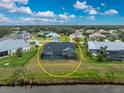 Aerial view showcasing the home's location and backyard pool at 27072 Ecuador Dr, Punta Gorda, FL 33983