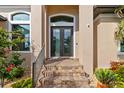 Inviting front entrance with double doors and landscaped walkway at 3937 Bal Harbor Blvd, Punta Gorda, FL 33950