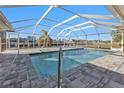 Relaxing screened pool area with paver deck at 4107 Rock Creek Dr, Port Charlotte, FL 33948