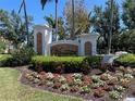 Community entrance sign showcasing the Vivante name and landscaping at 99 Vivante Blvd # 415, Punta Gorda, FL 33950