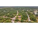 Aerial view showcasing the home's private setting at 5208 Griggs Ave, North Port, FL 34291