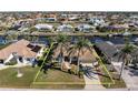 Property view showcasing canal-front location and neighborhood context at 1131 Via Tripoli, Punta Gorda, FL 33950