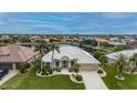 Property overview showcasing home's waterfront location at 1431 Grebe Dr, Punta Gorda, FL 33950