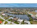 Bird's eye view of home near waterway, showing neighborhood at 1431 Grebe Dr, Punta Gorda, FL 33950