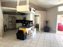 Spacious kitchen with stainless steel appliances and an island at 16161 Juarez Cir, Punta Gorda, FL 33955