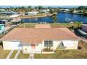 Single story home with canal access and a large backyard at 21094 Edgewater Dr, Port Charlotte, FL 33952