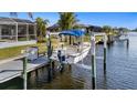 Private boat dock with lift for convenient water access at 18170 Avonsdale Cir, Port Charlotte, FL 33948