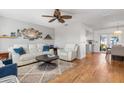 Bright and airy living room with white leather furniture at 20430 Dial Ave, Port Charlotte, FL 33952