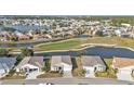 Community overview showing houses, golf course, and water features at 24356 Westgate Blvd, Punta Gorda, FL 33980