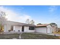 Front view of house showcasing a well-maintained lawn at 3128 Ponce De Leon Blvd, North Port, FL 34291