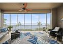 Spacious screened balcony overlooking the water; comfy seating at 95 N Marion Ct # 233, Punta Gorda, FL 33950