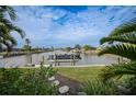 Private dock with boat lift in a peaceful waterfront community at 1320 Appian Dr, Punta Gorda, FL 33950