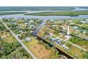 Aerial view showing home's location on a canal at 28434 Sabal Palm Dr, Punta Gorda, FL 33982