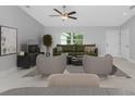 Bright living room with modern furniture and high ceilings at 3329 Casco Cir, North Port, FL 34288