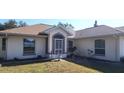 Single story house with attached garage and well maintained landscaping at 4330 Shappell St, Port Charlotte, FL 33948