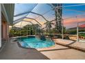 Enclosed, heated pool with fountain and screened patio at 632 Balsam Apple Dr, Venice, FL 34293