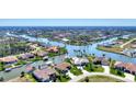 An aerial view of the community, highlighting its waterfront canals and homes at 15706 Viscount Cir, Port Charlotte, FL 33981