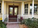 Inviting front entrance with double doors at 9458 Snapper Cir, Port Charlotte, FL 33981