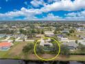 Aerial view showcasing a single-Gathering home's location in a residential area at 188 Broadmoor Ln, Rotonda West, FL 33947
