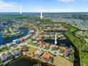 Wide aerial showcasing waterfront community, homes, and waterways at 3513 Terin Ct, Punta Gorda, FL 33950