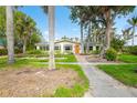 House exterior showcasing a landscaped front yard at 110 Chasteen St, Punta Gorda, FL 33950