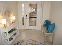 Entryway showcasing a decorative rug and stylish seating at 1601 Park Beach Cir # 136/18, Punta Gorda, FL 33950