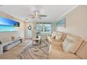 Spacious living room with comfy seating and large TV at 526 Allen St, Punta Gorda, FL 33950