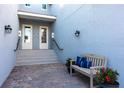 Private courtyard with a bench and landscaping at 14138 Poppy Field Loop # 4122, Punta Gorda, FL 33955