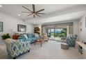 Relaxing living room featuring comfortable seating, large windows and access to lanai at 1780 Deborah Dr # 15, Punta Gorda, FL 33950