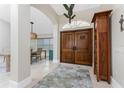 Bright entry with hardwood floors and double doors at 3412 Nighthawk Ct, Punta Gorda, FL 33950