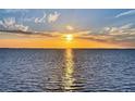 Stunning sunset over the water at 1 Colony Point Dr # A19, Punta Gorda, FL 33950