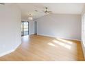 Light and airy living room featuring light hardwood floors and neutral walls at 1612 Nuremberg Blvd, Punta Gorda, FL 33983