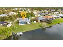 Home located on a canal with a backyard pool and shed at 22259 Priscilla Ave, Port Charlotte, FL 33954