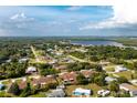 Aerial view showing property location and surrounding neighborhood at 27251 Adams St # 212, Punta Gorda, FL 33983